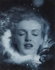 Marilyn Monroe [Blue], c.1945 Silver gelatin print on blue-tinted paper, printed c.1960, image/sheet size 35 x 27cm, with de Dienes' credit stamp verso by Andre de Dienes, print, sold Nov 2025