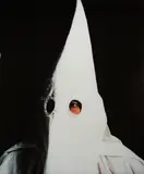 Klanswoman [Grand Klaliff - Knights of the Ku Klux Klan] by Andres Serrano, print, sold Nov 2025