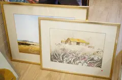 Meadow before derelict farm buildings and one other by Paul Evans, watercolour and gouaches, sold Jul 2025