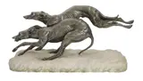 A French Art Deco silvered bronze group of two running hounds by Thomas François Cartier, bronze, sold Mar 2025