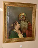 An orientalism portrait by R. A. Bartlett, oil on canvas, sold May 2024