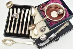 to include a boxed silver bottle coaster hallmarked 'M C Hersey & Son Ltd' by Assorted Silver Items, sculpture, sold May 2024