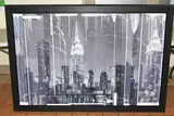 A rooftop view of new york city by Kris Hardy, mixed media on canvas, sold Nov 2023
