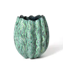 Wavy form vessel, 2023press moulded then altered, grey-green wax resist,impressed seal marks, 19cm by Peter Beard, photograph, offered Nov 2023