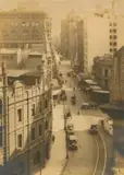 Castlereagh Street, Sydney – Corner Of Hunter Looking South From Bligh by Harold Cazneaux, c.1920, silver gelatin photograph, sold Jun 2020