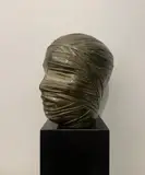 Tête secrète by Igor Mitoraj, Épreuve en bronze à patine brun mordoré, sold Dec 2023
