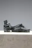 Sophia ou Femme allongée, le bras droit reposant sur une pierre by Antoniucci Voltigera Volti, Bronze à patine noire et reflets bleus, sold Dec 2014
