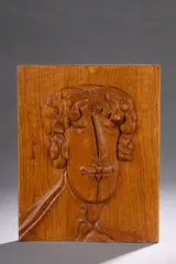 Sans titre by Pierre Dedieu, Panneau visage coi Bas-relief en bois naturel sculpté, non signé, sold Oct 2025