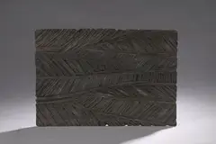 Sans titre by Pierre Dedieu, 1970, Panneau aux grandes feuilles d'arbres Bas-relief en bois sculpté et patiné, sold Oct 2025