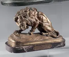Lion au serpent by Joseph Chemin, Bronze à patine doré signé en creux sur la terrasse, sold Jun 2024