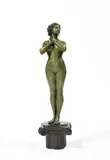 Jeune femme nue debout sur un chapiteau by Affortunato Gory, Bronze à patine verte, sold Apr 2022
