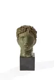 Tête d'éphèbe antique by Robert Couturier, Épreuve en plâtre laqué vert à l'imitation du bronze, sold Jun 2022