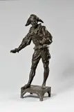 Arlequin tenant une mandoline by Emile Picault, Bronze à patine brune, sold Feb 2026