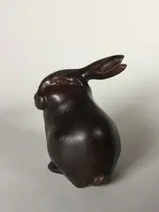 Lapin tête tournée by Édouard-Marcel Sandoz, Epreuve en bronze à patine brun nuancé, sold Feb 2022