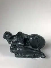 Femme allongée by Antoniucci Volti, Epreuve en bronze à patine noire, sold Feb 2022