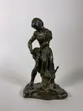 Paysanne retroussant son jupon by Gaston Broquet, Épreuve en bronze à patine brun nuancé, sold Dec 2021