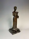 La liseuse by Georges Van der Straeten, Epreuve en bronze à patine brun nuancé rouge, sold May 2018