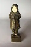 Le poupon au manteau russe by Joseph Le Guluche, Epreuve en bronze à patine brun clair nuancé, sold May 2018