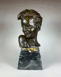 Buste d'enfant by Victor Demanet, Epreuve en bronze à patine brun nuancé, sold Jun 2021