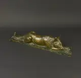 Chien couché by Louis-Albert Carvin, Bronze patiné, sold May 2026