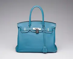 A BLEU JEAN TOGO LEATHER BIRKIN 30 WITH PALLADIUM HARDWARE by Hermès, A BLEU JEAN TOGO LEATHER BIRKIN 30 WITH PALLADIUM HARDWARE, sold Dec 2024