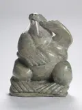 Walrus by Kiugak Ashoona, stone sculpture with ivory, sold Aug 2024
