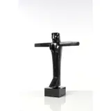 Christ by Émile Gilioli, 1960, Bronze poli à patine noire reposant sur un socle en marbre gris, sold Dec 2018