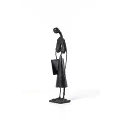 Le carton à dessin by Robert Couturier, 1996, Bronze à patine brune, sold May 2019