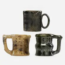 Three Mugs by George E. Ohr, sold May 2017