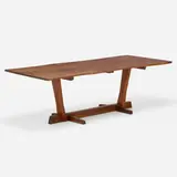 Conoid dining table by Mira Nakashima, 2010, American black walnut, rosewood, sold Mar 2023