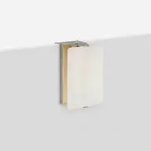 Wall sconce by Charlotte Perriand, 1963, chrome-plated and enameled steel, sold Mar 2023