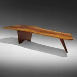 Slab coffee table by George Nakashima, c. 1957, English walnut, rosewood, sold Mar 2023