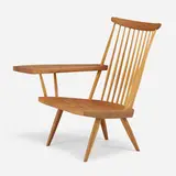 Lounge chair with right arm by George Nakashima, c. 1978, American black walnut, hickory, sold Mar 2023