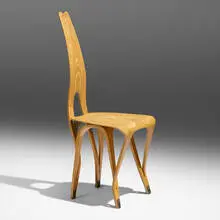 Unique Copenhagen chair by Carlo Mollino, 1951, carved and bent ash plywood, brass, sold Mar 2023