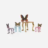 Collection of miniature Butterfly chair models by Pedro Friedeberg, c. 1970, carved, gilt and hand-painted Mexican mahogany with paper applique, sold Mar 2023