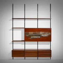Sistema E22 shelving by Osvaldo Borsani and Arnaldo Pomodoro, 1957, walnut, enameled steel and aluminum, copper, glass, sold Mar 2023