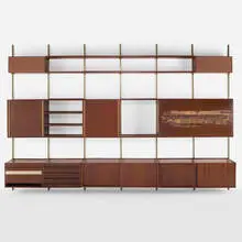 Sistema E22 shelving by Osvaldo Borsani and Arnaldo Pomodoro, 1957, walnut, mahogany, patinated metal, copper, linen, glass, sold Mar 2023