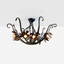 Unique chandelier from Rococo Chocolates by Mark Brazier-Jones, c. 1988, forged and fabricated polychromed steel, sold Mar 2023