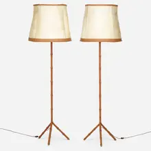 Floor lamps, pair by Jacques Adnet, c. 1950, saddle-stitched leather over steel, milk glass, vellum, brass, sold Mar 2023