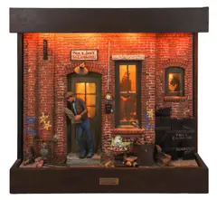 cityscape sculpture diorama by Michael Garman, mixed media, sold Apr 2023