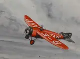 A biplane flying by Howard Leigh, watercolour, sold Nov 2023