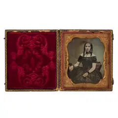 Portrait of a woman in an elegant dress by Cornelius Jabez Hughes, photograph, sold Oct 2025
