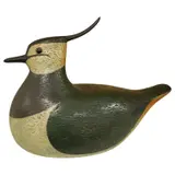 A carved and painted wood decoy lapwing by John Searle, sculpture, sold Mar 2025