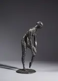 Femme nue enfilant son bas by Hubert Yencesse, Bronze à patine brune, sold Nov 2024