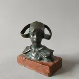 Jeune bretonne en buste by Ruth Anna Maria Miles, Fonte Eugène BLOT Bronze patiné, reposant sur un marbre rouge, sold May 2025