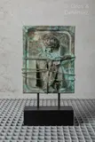 Femme attachée by Antoni Clavé, 1970, Epreuve en bronze patiné vert et ocre, sold Mar 2025