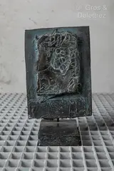 Relleu by Antoni Clavé, 1970, Epreuve en bronze patiné brun et bleu, sold Mar 2025