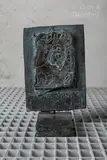 Relleu by Antoni Clavé, 1970, Epreuve en bronze patiné brun et bleu, sold Mar 2025