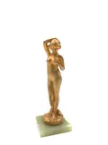 Femme nue les bras levés by Alexandre Auguste Caron, Épreuve en bronze doré, sold Jun 2023