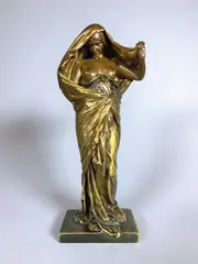 La Nature se dévoilant à la Science by Louis-Ernest Barrias, Epreuve en bronze à triple patine brun-clair, vert foncé et vieil or, sold Feb 2021
